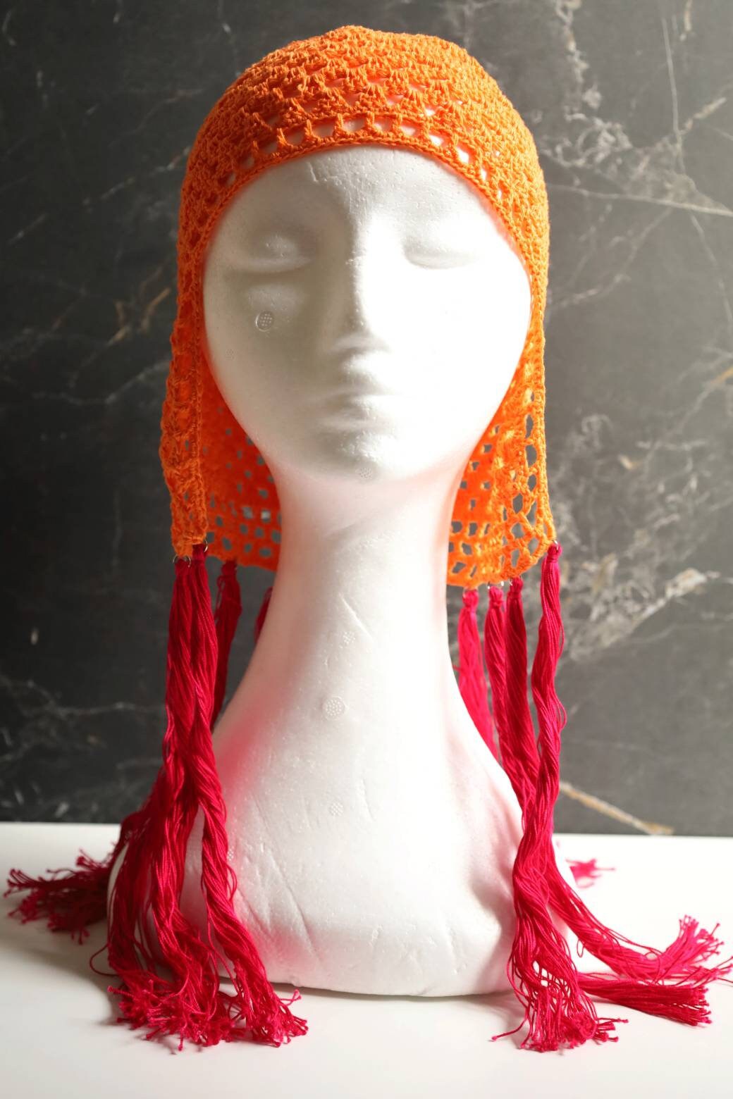 Orange helmet with pink tassels Orange Pink hair